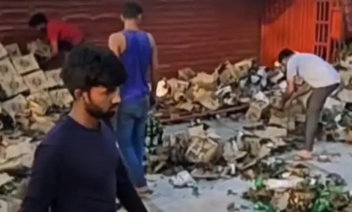 Truck full of beer boxes overturned on the road